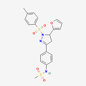 molecular formula C21H21N3O5S2 B2979545 N-{4-[5-(furan-2-yl)-1-(4-methylbenzenesulfonyl)-4,5-dihydro-1H-pyrazol-3-yl]phenyl}methanesulfonamide CAS No. 851780-97-7
