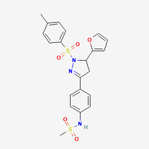 B2979545 N-(4-(5-(furan-2-yl)-1-tosyl-4,5-dihydro-1H-pyrazol-3-yl)phenyl)methanesulfonamide CAS No. 851780-97-7