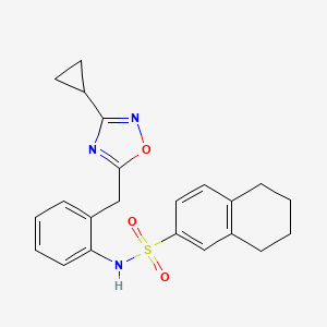 molecular formula C22H23N3O3S B2979717 N-(2-((3-cyclopropyl-1,2,4-oxadiazol-5-yl)methyl)phenyl)-5,6,7,8-tetrahydronaphthalene-2-sulfonamide CAS No. 1797602-38-0