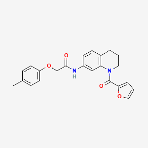 molecular formula C23H22N2O4 B2983479 N-(1-(furan-2-carbonyl)-1,2,3,4-tetrahydroquinolin-7-yl)-2-(p-tolyloxy)acetamide CAS No. 946367-61-9