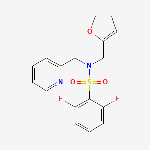 molecular formula C17H14F2N2O3S B2983543 2,6-difluoro-N-(furan-2-ylmethyl)-N-(pyridin-2-ylmethyl)benzenesulfonamide CAS No. 1286704-84-4