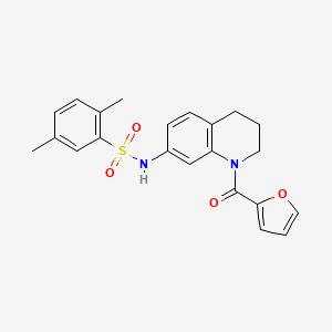 molecular formula C22H22N2O4S B2984679 N-[1-(furan-2-carbonyl)-1,2,3,4-tetrahydroquinolin-7-yl]-2,5-dimethylbenzene-1-sulfonamide CAS No. 946267-74-9