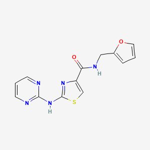 molecular formula C13H11N5O2S B2985018 N-(furan-2-ylmethyl)-2-(pyrimidin-2-ylamino)thiazole-4-carboxamide CAS No. 1251564-16-5