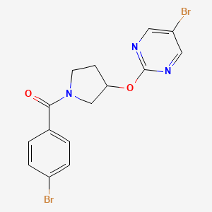 molecular formula C15H13Br2N3O2 B2986557 5-Bromo-2-{[1-(4-bromobenzoyl)pyrrolidin-3-yl]oxy}pyrimidine CAS No. 2097894-41-0