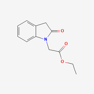 molecular formula C12H13NO3 B2987409 ethyl 2-(2-oxo-2,3-dihydro-1H-indol-1-yl)acetate CAS No. 132382-20-8