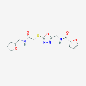 N-((5-((2-oxo-2-(((tetrahydrofuran-2-yl)methyl)amino)ethyl)thio)-1,3,4-oxadiazol-2-yl)methyl)furan-2-carboxamide