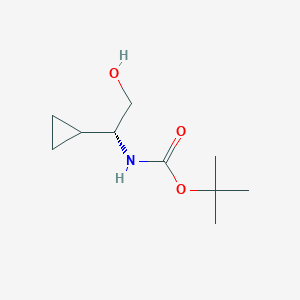 molecular formula C10H19NO3 B2996245 tert-Butyl N-[(1R)-1-cyclopropyl-2-hydroxyethyl]carbamate CAS No. 1001414-89-6