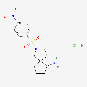 molecular formula C14H20ClN3O4S B2997618 2-(4-Nitrobenzenesulfonyl)-2-azaspiro[4.4]nonan-6-amine hydrochloride CAS No. 1798713-08-2