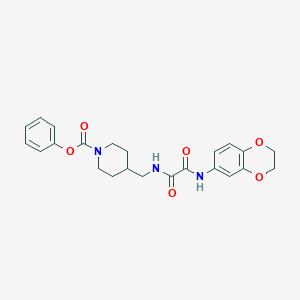 molecular formula C23H25N3O6 B2998446 Phenyl 4-((2-((2,3-dihydrobenzo[b][1,4]dioxin-6-yl)amino)-2-oxoacetamido)methyl)piperidine-1-carboxylate CAS No. 1234811-36-9