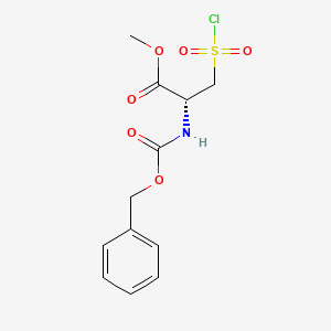molecular formula C12H14ClNO6S B3001390 Methyl (2R)-3-chlorosulfonyl-2-(phenylmethoxycarbonylamino)propanoate CAS No. 1989638-24-5