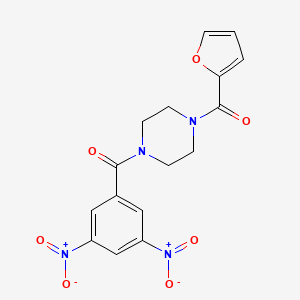 (4-(3,5-Dinitrobenzoyl)piperazin-1-yl)(furan-2-yl)methanone