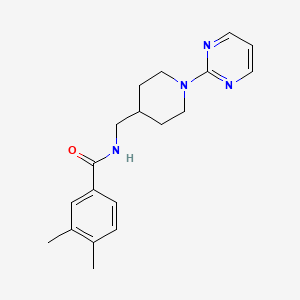 3,4-dimethyl-N-((1-(pyrimidin-2-yl)piperidin-4-yl)methyl)benzamide