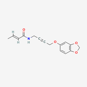 molecular formula C15H15NO4 B3002107 (2E)-N-[4-(2H-1,3-benzodioxol-5-yloxy)but-2-yn-1-yl]but-2-enamide CAS No. 1448139-74-9