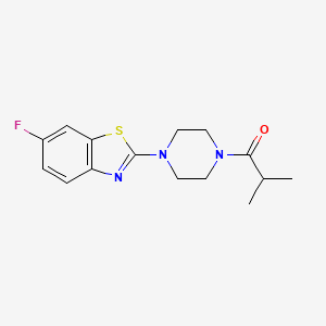 molecular formula C15H18FN3OS B3006349 1-[4-(6-Fluoro-1,3-benzothiazol-2-yl)piperazin-1-yl]-2-methylpropan-1-one CAS No. 897473-15-3