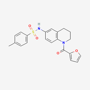 molecular formula C21H20N2O4S B3008098 N-[1-(furan-2-carbonyl)-1,2,3,4-tetrahydroquinolin-6-yl]-4-methylbenzene-1-sulfonamide CAS No. 946246-80-6