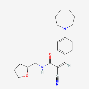 (Z)-3-[4-(Azepan-1-yl)phenyl]-2-cyano-N-(oxolan-2-ylmethyl)prop-2-enamide