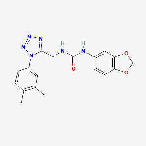 molecular formula C18H18N6O3 B3009975 1-(benzo[d][1,3]dioxol-5-yl)-3-((1-(3,4-dimethylphenyl)-1H-tetrazol-5-yl)methyl)urea CAS No. 941964-53-0
