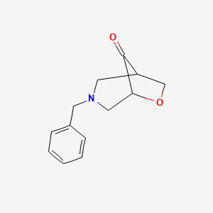 molecular formula C13H15NO2 B3012837 3-Benzyl-6-oxa-3-azabicyclo[3.2.1]octan-8-one CAS No. 1384427-80-8
