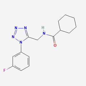 molecular formula C15H18FN5O B3013082 N-((1-(3-fluorophenyl)-1H-tetrazol-5-yl)methyl)cyclohexanecarboxamide CAS No. 921166-93-0