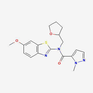 molecular formula C18H20N4O3S B3015022 N-(6-methoxybenzo[d]thiazol-2-yl)-1-methyl-N-((tetrahydrofuran-2-yl)methyl)-1H-pyrazole-5-carboxamide CAS No. 1171743-31-9