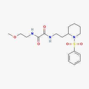 N1-(2-methoxyethyl)-N2-(2-(1-(phenylsulfonyl)piperidin-2-yl)ethyl)oxalamide