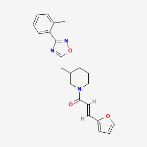molecular formula C22H23N3O3 B3017594 (E)-3-(furan-2-yl)-1-(3-((3-(o-tolyl)-1,2,4-oxadiazol-5-yl)methyl)piperidin-1-yl)prop-2-en-1-one CAS No. 1706508-51-1