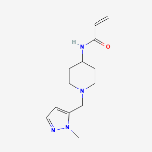 molecular formula C13H20N4O B3019158 N-[1-[(2-Methylpyrazol-3-yl)methyl]piperidin-4-yl]prop-2-enamide CAS No. 2411308-03-5