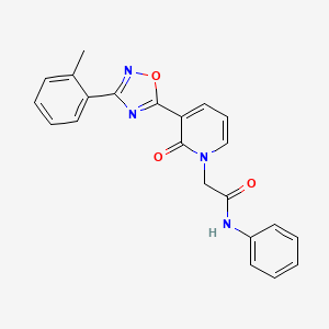 B3020832 2-[3-[3-(2-methylphenyl)-1,2,4-oxadiazol-5-yl]-2-oxopyridin-1(2H)-yl]-N-phenylacetamide CAS No. 1251633-82-5