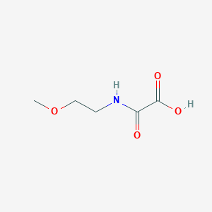 [(2-Methoxyethyl)carbamoyl]formic acid