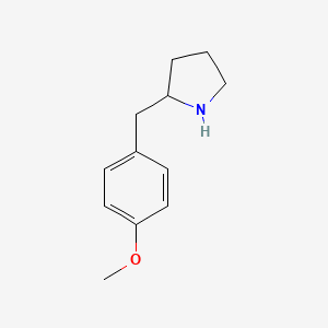 2-[(4-Methoxyphenyl)methyl]pyrrolidine