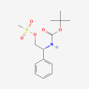 B3026584 (R)-2-((tert-butoxycarbonyl)amino)-2-phenylethyl methanesulfonate CAS No. 102089-75-8