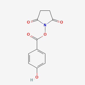 molecular formula C11H9NO5 B3043008 Succinimidyl-4-hydroxybenzoate CAS No. 70074-31-6