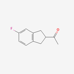 1-(5-fluoro-2,3-dihydro-1H-inden-2-yl)ethanone