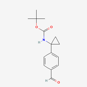 molecular formula C15H19NO3 B3049128 tert-Butyl N-[1-(4-formylphenyl)cyclopropyl]carbamate CAS No. 1951439-73-8