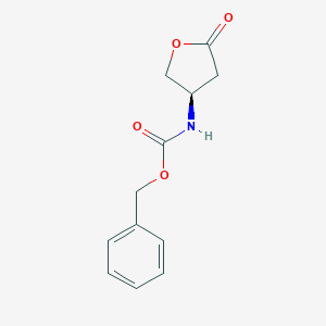 molecular formula C12H13NO4 B030522 Benzyl (R)-5-oxotetrahydrofuran-3-ylcarbamate CAS No. 118399-28-3