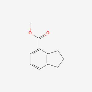 molecular formula C11H12O2 B3057886 Methyl 2,3-dihydro-1H-indene-4-carboxylate CAS No. 86031-42-7