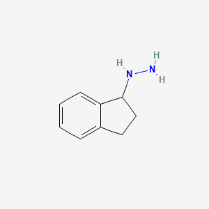 molecular formula C9H12N2 B3058695 Indan-1-YL-hydrazine CAS No. 91182-13-7