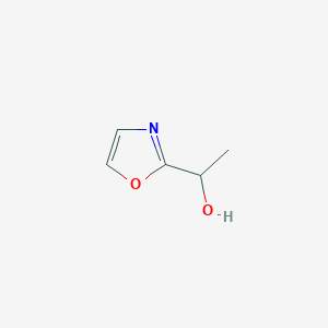 molecular formula C5H7NO2 B3086665 1-(Oxazol-2-yl)ethanol CAS No. 1161775-91-2