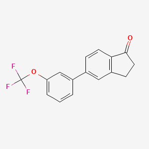 molecular formula C16H11F3O2 B3095053 5-(3-(Trifluoromethoxy)phenyl)-1-indanone CAS No. 1261833-72-0