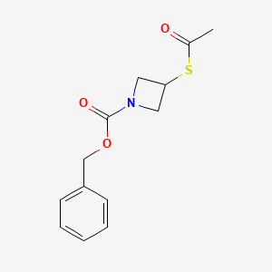 molecular formula C13H15NO3S B3096390 Benzyl 3-acetylsulfanylazetidine-1-carboxylate CAS No. 128117-23-7