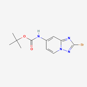 molecular formula C11H13BrN4O2 B3100938 tert-Butyl N-{2-bromo-[1,2,4]triazolo[1,5-a]pyridin-7-yl}carbamate CAS No. 1380331-50-9