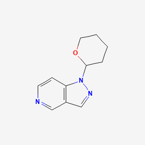molecular formula C11H13N3O B3102354 1-(Tetrahydro-2H-pyran-2-yl)-1H-pyrazolo[4,3-c]pyridine CAS No. 1416714-27-6