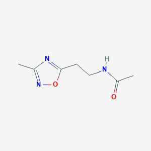 molecular formula C7H11N3O2 B3108990 N-[2-(3-methyl-1,2,4-oxadiazol-5-yl)ethyl]acetamide CAS No. 1697657-82-1