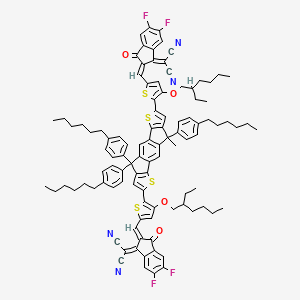 2-[(2E)-2-[[5-[15-[5-[(Z)-[1-(dicyanomethylidene)-5,6-difluoro-3-oxoinden-2-ylidene]methyl]-3-(2-ethylhexoxy)thiophen-2-yl]-9,18,18-tris(4-hexylphenyl)-9-methyl-5,14-dithiapentacyclo[10.6.0.03,10.04,8.013,17]octadeca-1,3(10),4(8),6,11,13(17),15-heptaen-6-yl]-4-(2-ethylhexoxy)thiophen-2-yl]methylidene]-5,6-difluoro-3-oxoinden-1-ylidene]propanedinitrile
