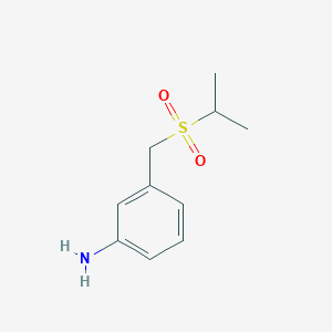 3-[(Propane-2-sulfonyl)methyl]aniline
