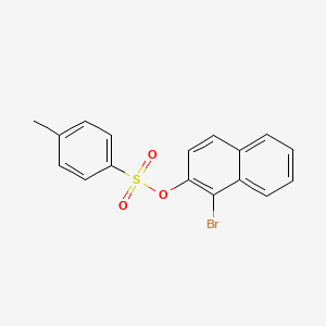 molecular formula C17H13BrO3S B3136884 1-Bromo-2-(tosyloxy)naphthalene CAS No. 42768-98-9