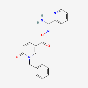 molecular formula C19H16N4O3 B3140008 N'-{[(1-benzyl-6-oxo-1,6-dihydro-3-pyridinyl)carbonyl]oxy}-2-pyridinecarboximidamide CAS No. 477864-10-1