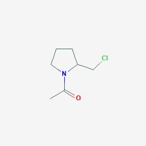 1-[2-(Chloromethyl)pyrrolidin-1-yl]ethan-1-one