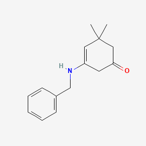molecular formula C15H19NO B3146023 3-(Benzylamino)-5,5-dimethylcyclohex-3-en-1-one CAS No. 587852-26-4