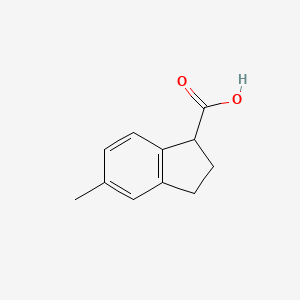 molecular formula C11H12O2 B3175143 5-methyl-2,3-dihydro-1H-indene-1-carboxylic acid CAS No. 956101-02-3